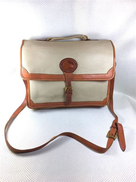 vintage dooney and bourke all weather leather fake|dooney and bourke briefcase vintage.